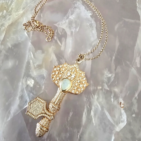 Elegant Rose Gold Key Pendant Necklace with moonstone center stone. - Picture 1 of 1